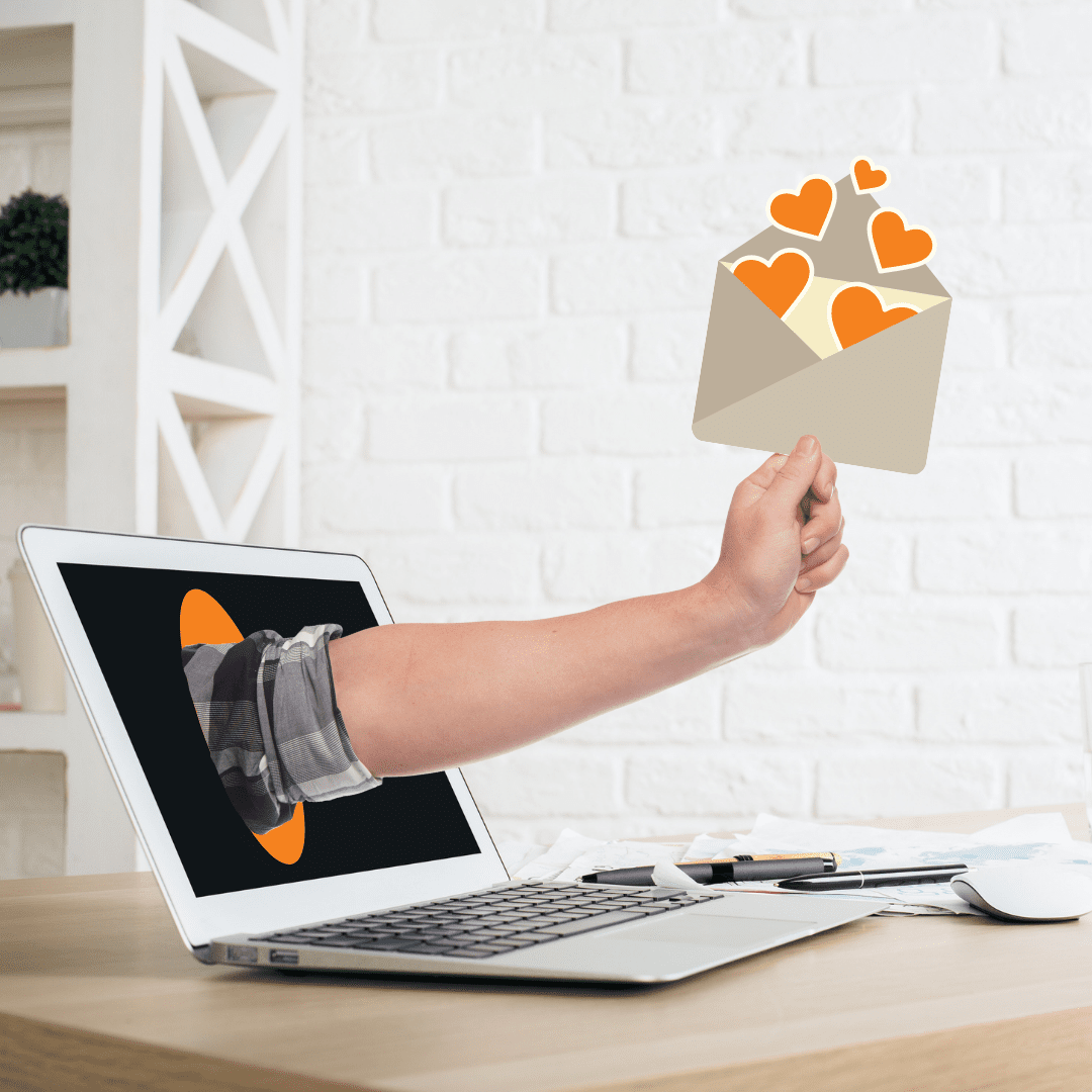 sähköpostimarkkinnoinnin mainoskuva, jossa käsi ojentaa kirjekuorta tietokoneen näytön läpi